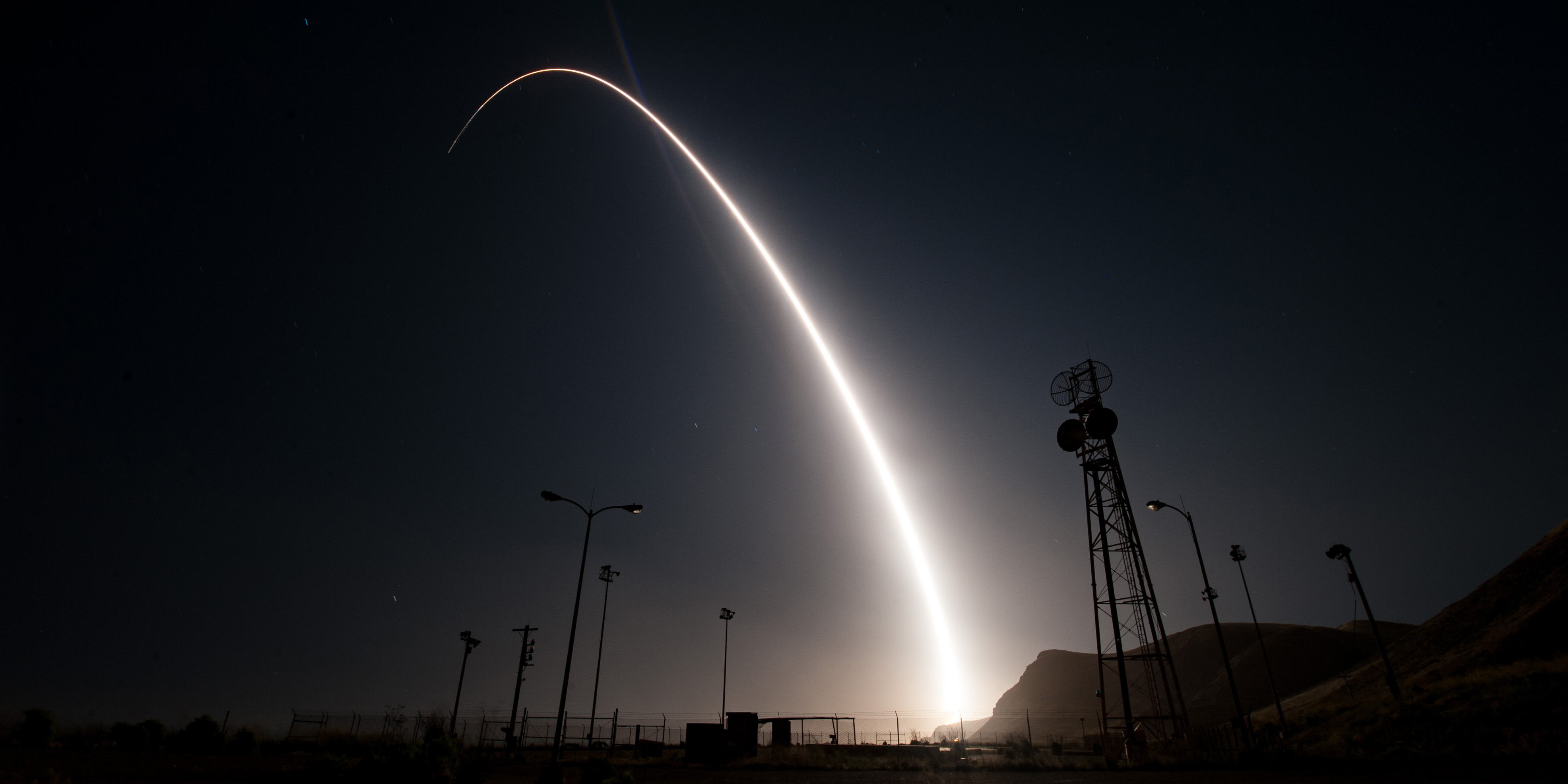 Minuteman rocket launch at night
